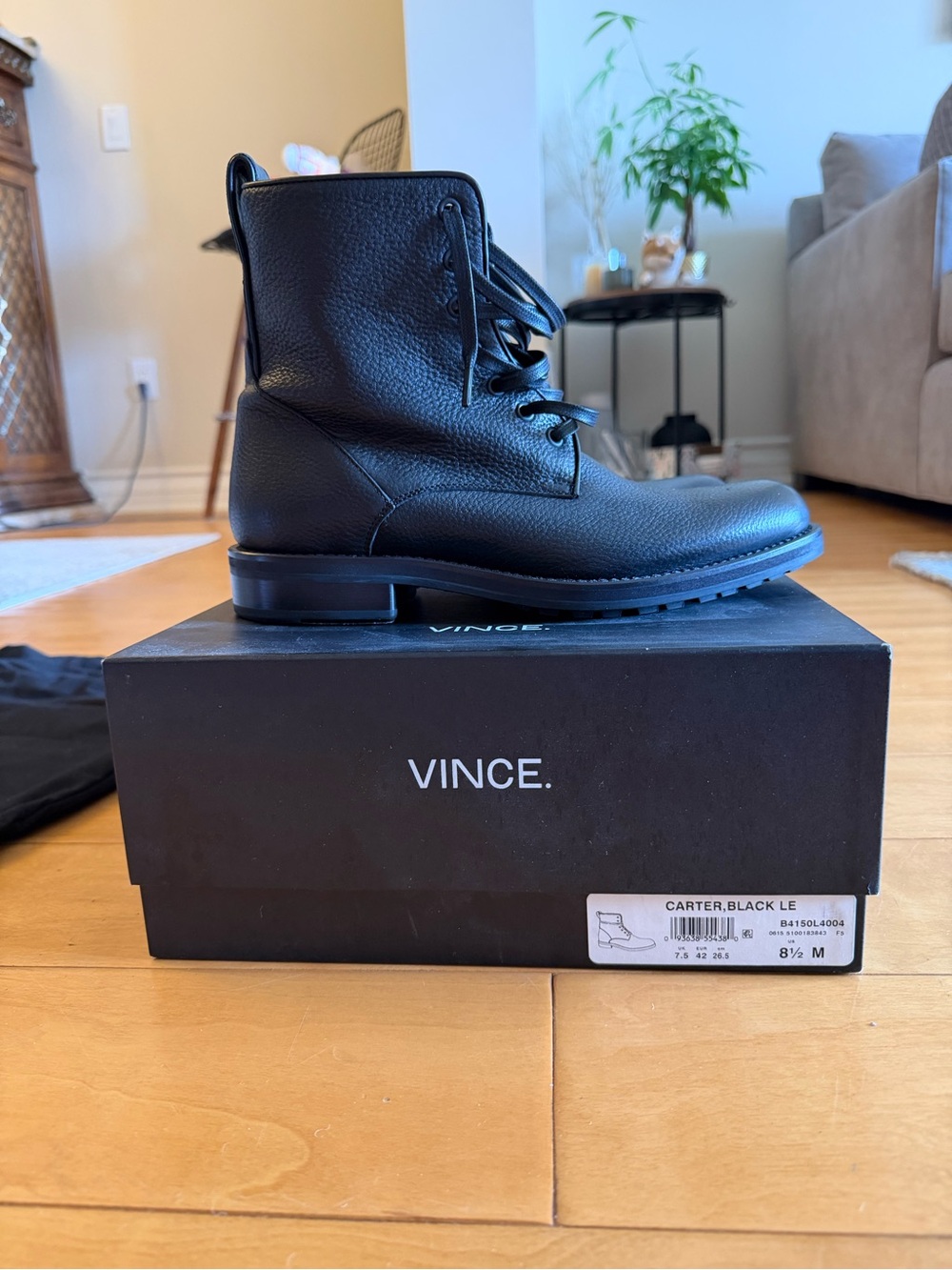 Vince Men’s Black Pebbled Leather Lace-Up Boots
With original shoe bag and box